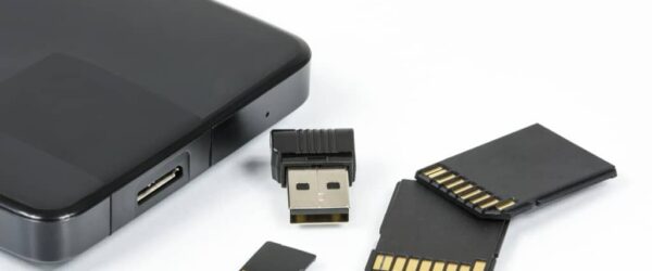 backup-company-data Removable media including an external hard drive, SD cards, and others.