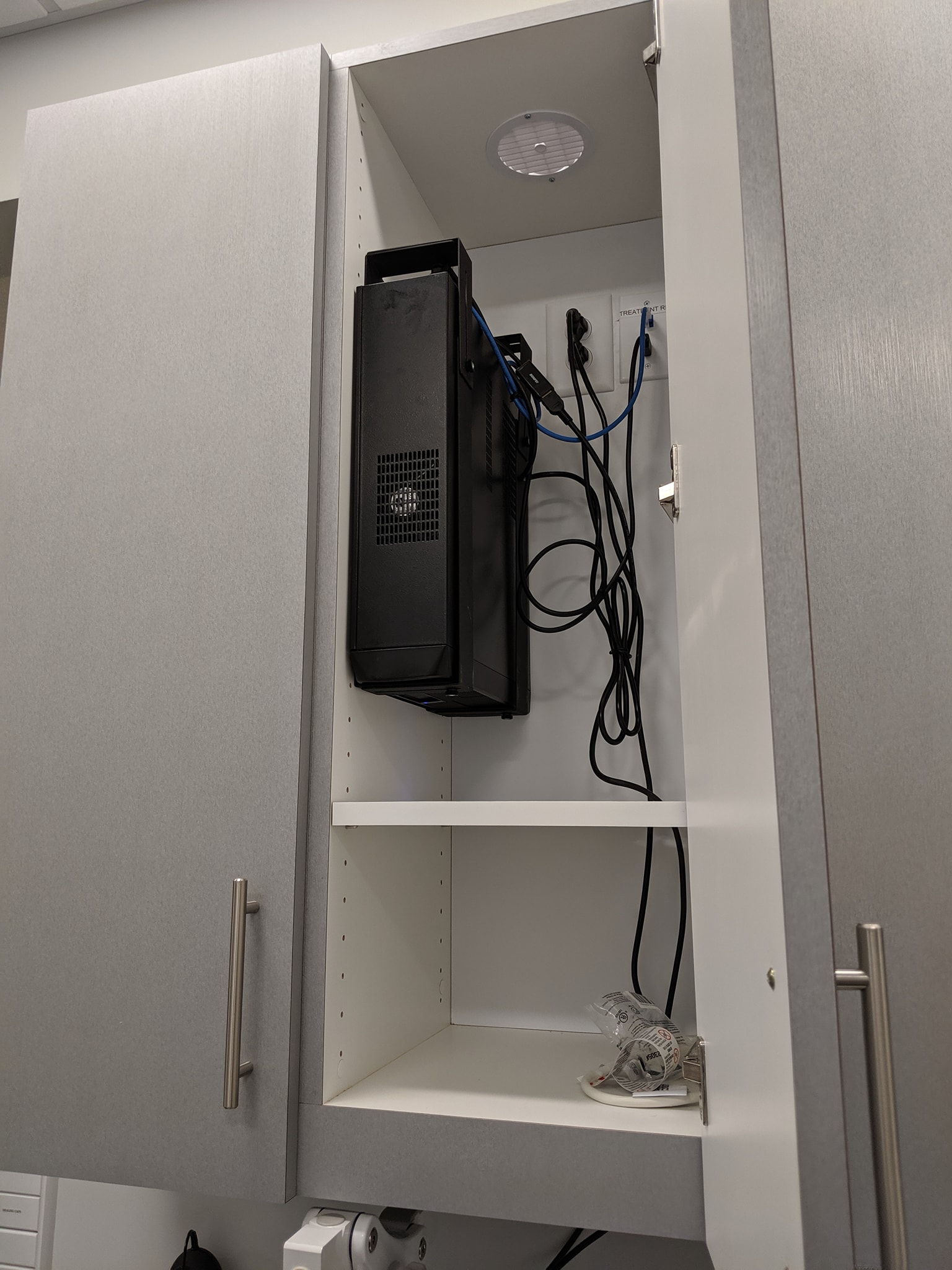 A Cape Fear Smiles server mounted in a cubby
