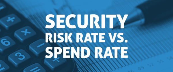 Security Risk Rate vs. Spend Rate Banner - Featuring a calculator, pen, and paper