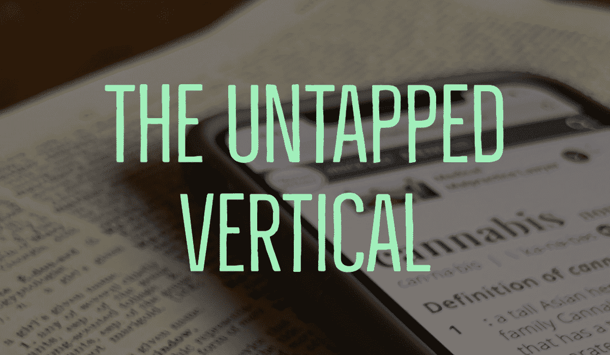 The Untapped Vertical Banner - Showing a phone with the word Cannabis on it, laying on a book