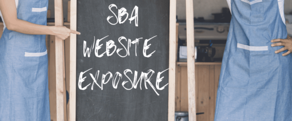 Two people pointing at a chalkboard with the words SBA Website Exposure on it.
