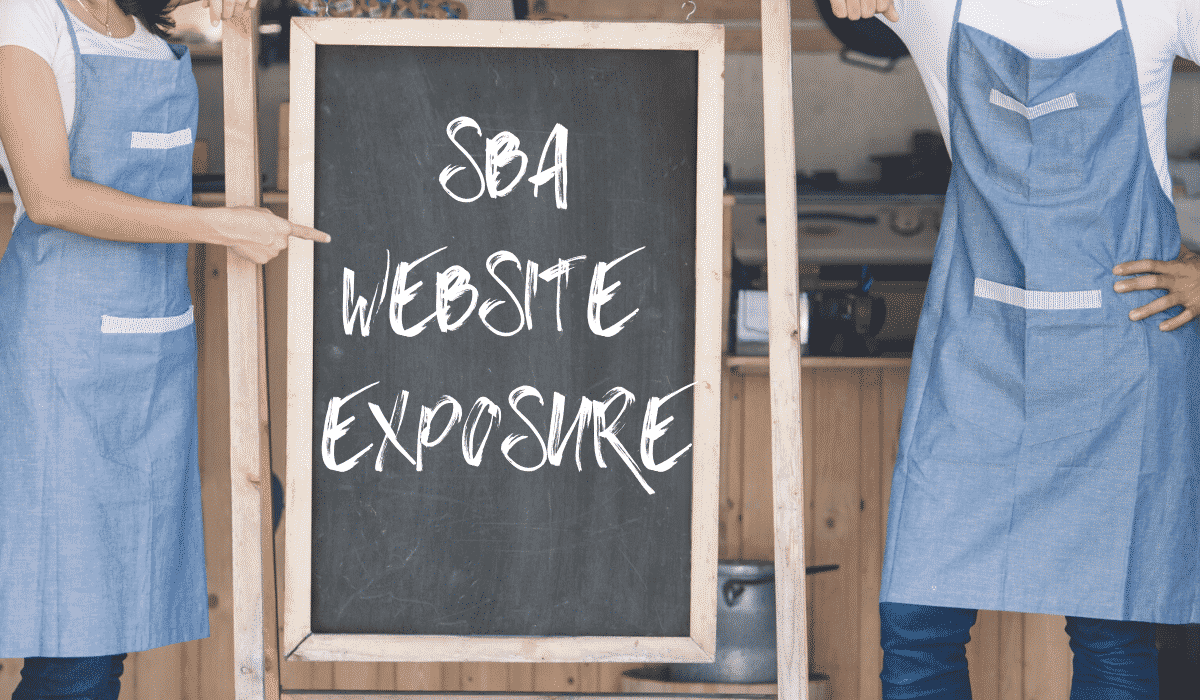 Two people pointing at a chalkboard with the words SBA Website Exposure on it.