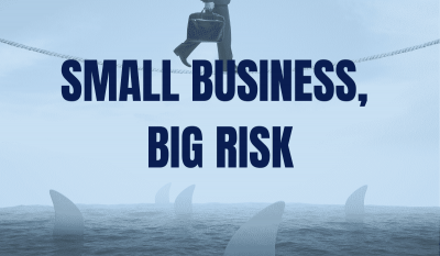 Small Business Big Risk Banner featuring a businessman walking on a chain over shark-filled water.