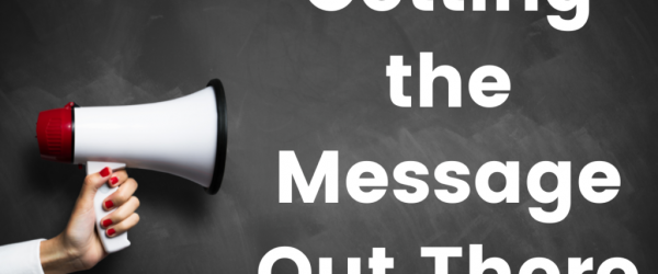 Getting the Message Out There Banner - Featuring a hand holding a megaphone