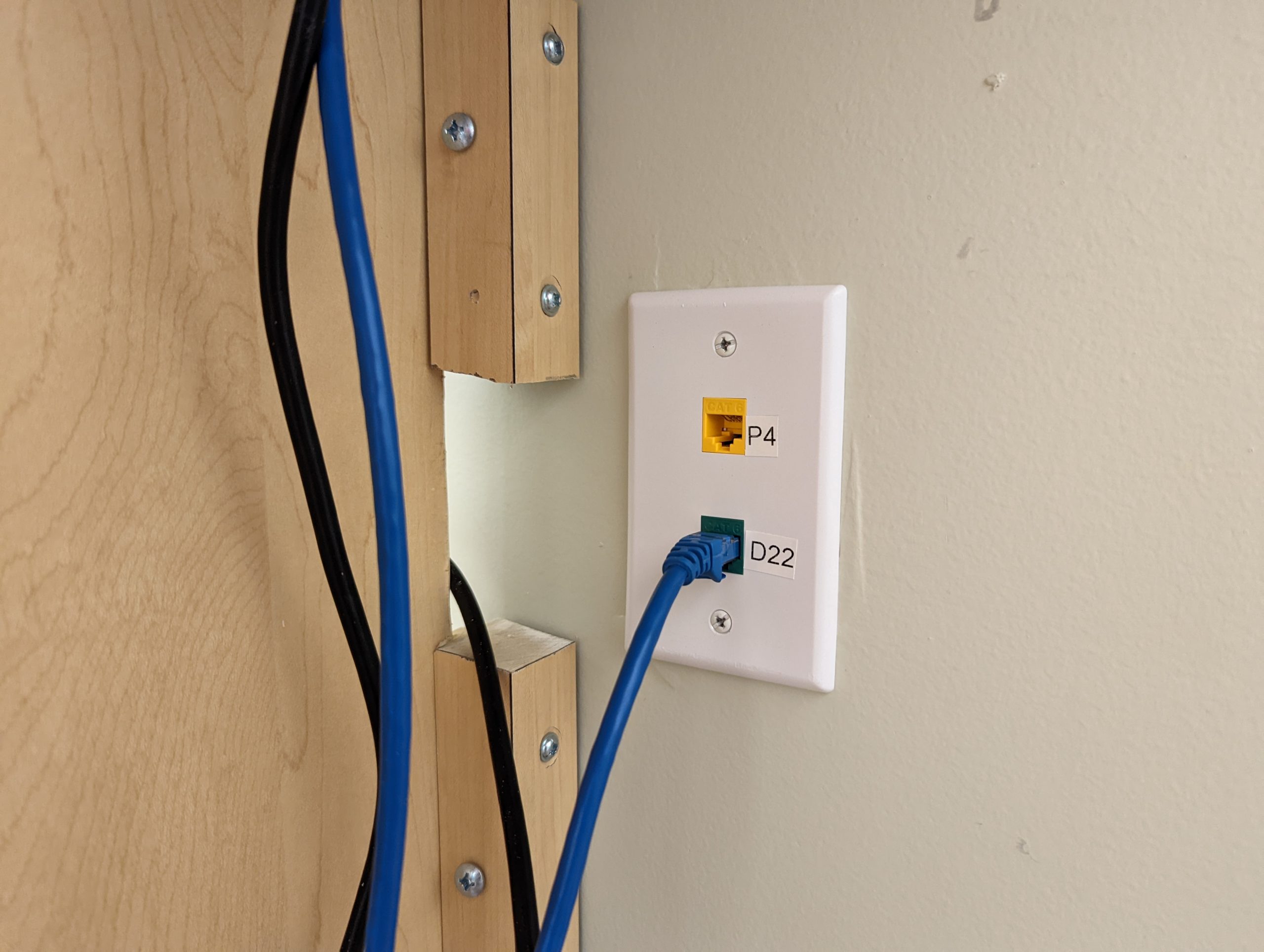PXL_20220527_213655164.MP An ethernet cord plugged into the wall