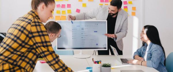 Man giving a presentation to a group of employees about cybersecurity in Myrtle Beach.