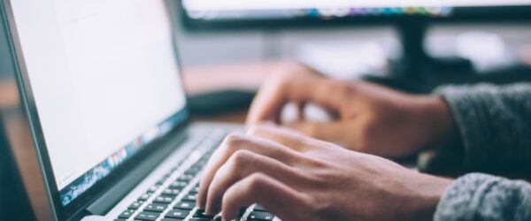 Individual implementing Wrightsville Beach cybersecurity measures while browsing the internet safely