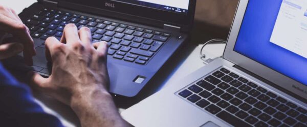 Top Benefits of Outsourcing IT Support for Businesses Experienced IT Technician offering outsourced IT support in Myrtle Beach to businesses