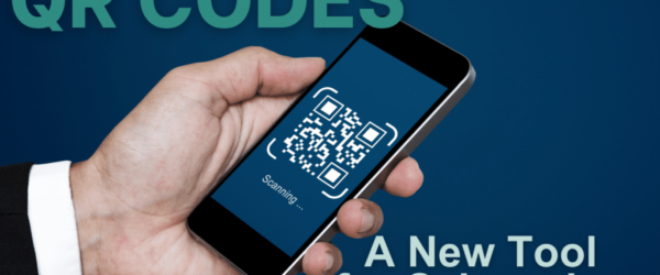 The words QR Codes: A New Tool for Cybercrime over a hand holding a phone with a QR code.