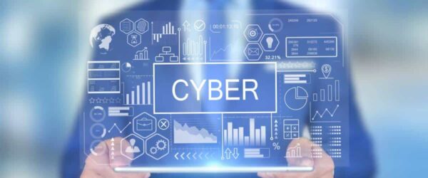 IT consultant holding a screen representing Wrightsville Beach cybersecurity