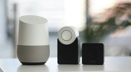 Smart home devices on a table in a home.