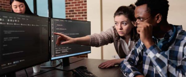 Why Your Business Needs A Cybersecurity Assessment and IT Consulting Before the Year Ends IT tech teaching about cybersecurity