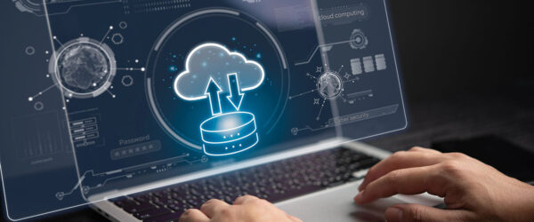 A person using a laptop experiencing Myrtle Beach business continuity with cloud computing.