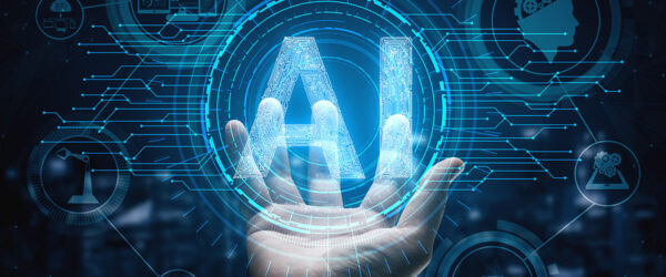AI in Hand A hand reaching out towards large, glowing letters "AI" surrounded by digital circuits and icons representing artificial intelligence concepts.