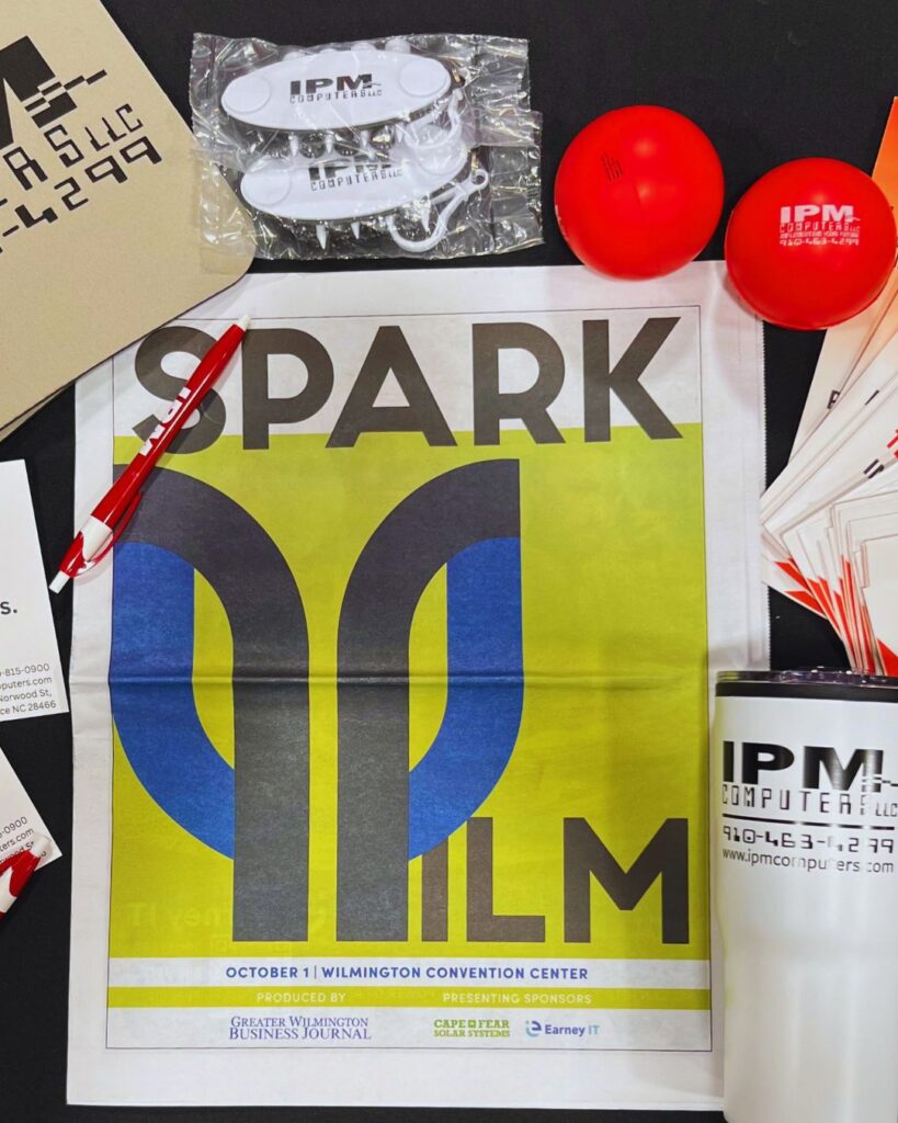 Close up of IPM swag at the Spark ILM Booth