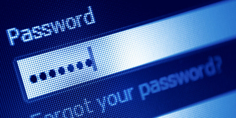 Close-up of a computer screen displaying a password entry field with dots representing hidden characters and a "Forgot your password?" link below it, all in a blue digital interface.