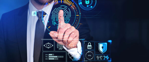 A businessman in a suit is interacting with a futuristic digital interface that displays biometric data and security icons, including a fingerprint, padlocks, and various statistics.