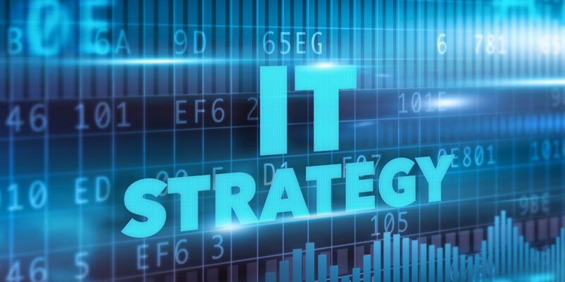 Digital graphic with glowing cyan text reading "IT STRATEGY" displayed over hexadecimal code and data charts.